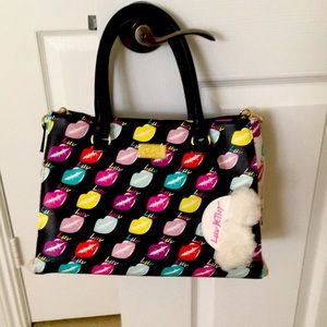 Betsey Johnson handbag with detachable strap.
